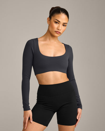 SoftMotion™ Scoop Neck Long Sleeve Crop Top with Built in Bra Shelf with Gray Logo | Coal