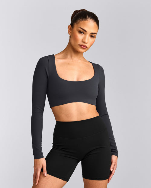 SoftMotion™ Scoop Neck Long Sleeve Crop Top with Built in Bra Shelf with Gray Logo | Coal