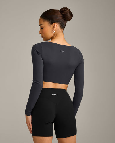 SoftMotion™ Scoop Neck Long Sleeve Crop Top with Built in Bra Shelf with Gray Logo | Coal