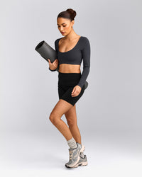 SoftMotion™ Scoop Neck Long Sleeve Crop Top with Built in Bra Shelf with Gray Logo | Coal