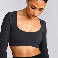 SoftMotion™ Scoop Neck Long Sleeve Crop Top with Built in Bra Shelf with Gray Logo | Coal