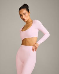 SoftMotion™ Scoop Neck Long Sleeve Crop Top with Built in Bra Shelf with Gray Logo | Soft Girl Pink