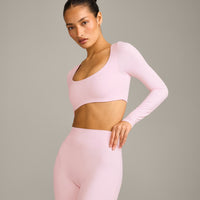 SoftMotion™ Scoop Neck Long Sleeve Crop Top with Built in Bra Shelf with Gray Logo | Soft Girl Pink