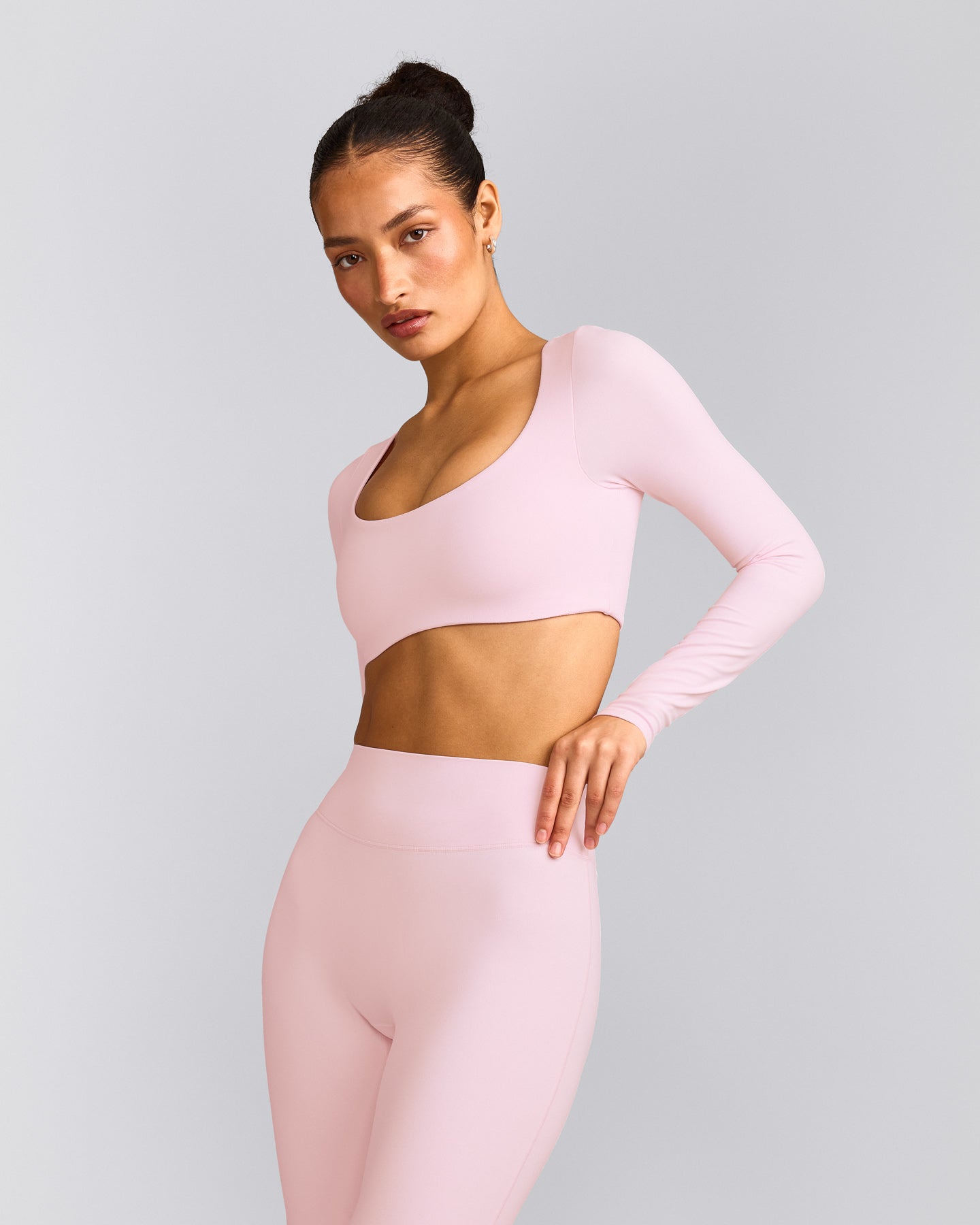 SoftMotion™ Scoop Neck Long Sleeve Crop Top with Built in Bra Shelf with Gray Logo | Soft Girl Pink