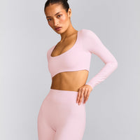 SoftMotion™ Scoop Neck Long Sleeve Crop Top with Built in Bra Shelf with Gray Logo | Soft Girl Pink