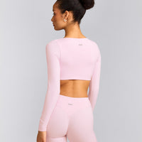 SoftMotion™ Scoop Neck Long Sleeve Crop Top with Built in Bra Shelf with Gray Logo | Soft Girl Pink