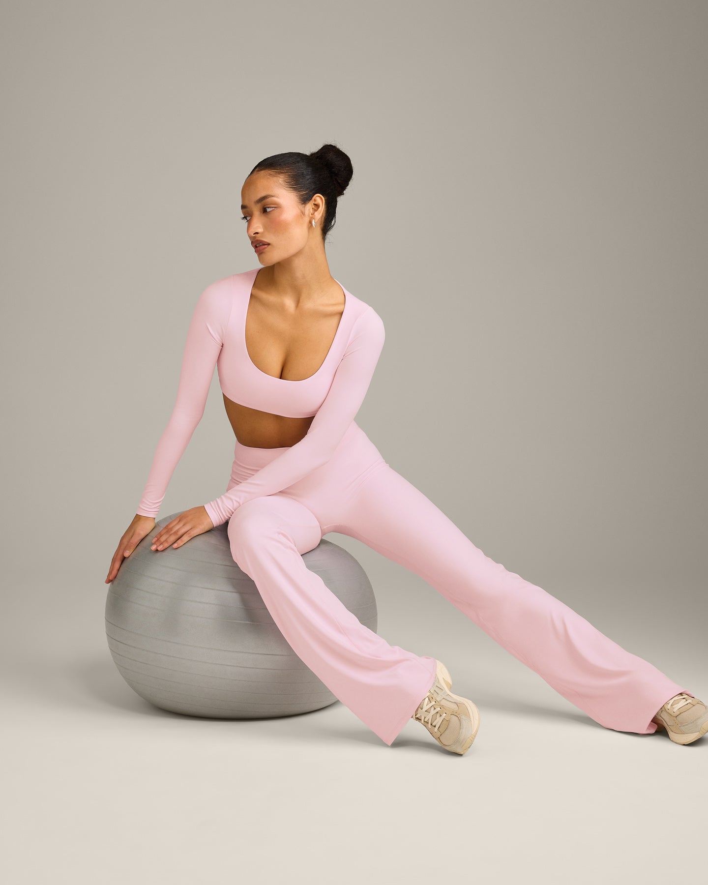 SoftMotion™ Scoop Neck Long Sleeve Crop Top with Built in Bra Shelf with Gray Logo | Soft Girl Pink