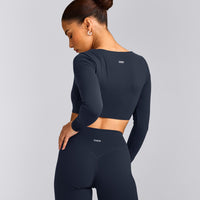 SoftMotion™ Scoop Neck Long Sleeve Crop Top with Built in Bra Shelf with Gray Logo | True Blue