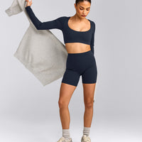 SoftMotion™ Scoop Neck Long Sleeve Crop Top with Built in Bra Shelf with Gray Logo | True Blue