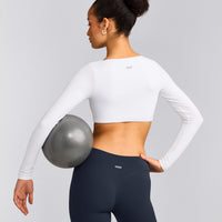 SoftMotion™ Scoop Neck Long Sleeve Crop Top with Built in Bra Shelf with Gray Logo | White