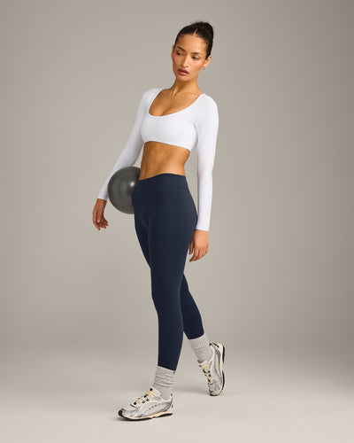 SoftMotion™ Scoop Neck Long Sleeve Crop Top with Built in Bra Shelf with Gray Logo | White
