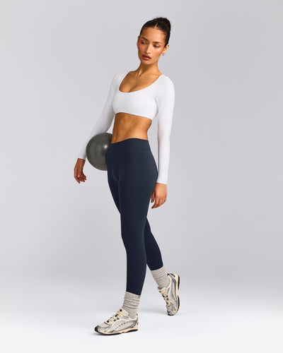 SoftMotion™ Scoop Neck Long Sleeve Crop Top with Built in Bra Shelf with Gray Logo | White