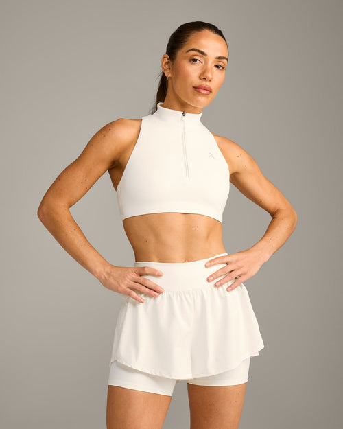 EasyLift™ Zip High Neck Sports Bra with Gray Logo | Marshmallow White
