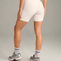 UnifiedMove High Waisted Shorts 6" with Reflective Logo | Marshmallow White