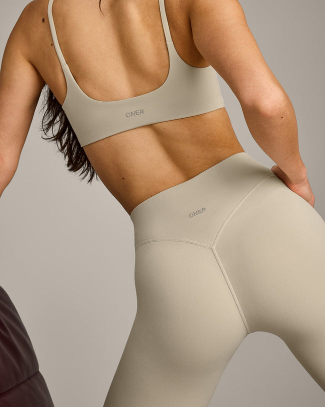 SoftMotion™ 3/4 Length Leggings with Gray Logo | Oatmeal