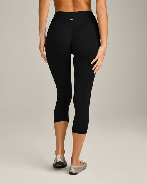 SoftMotion™ 3/4 Length Leggings with Gray Logo | Black