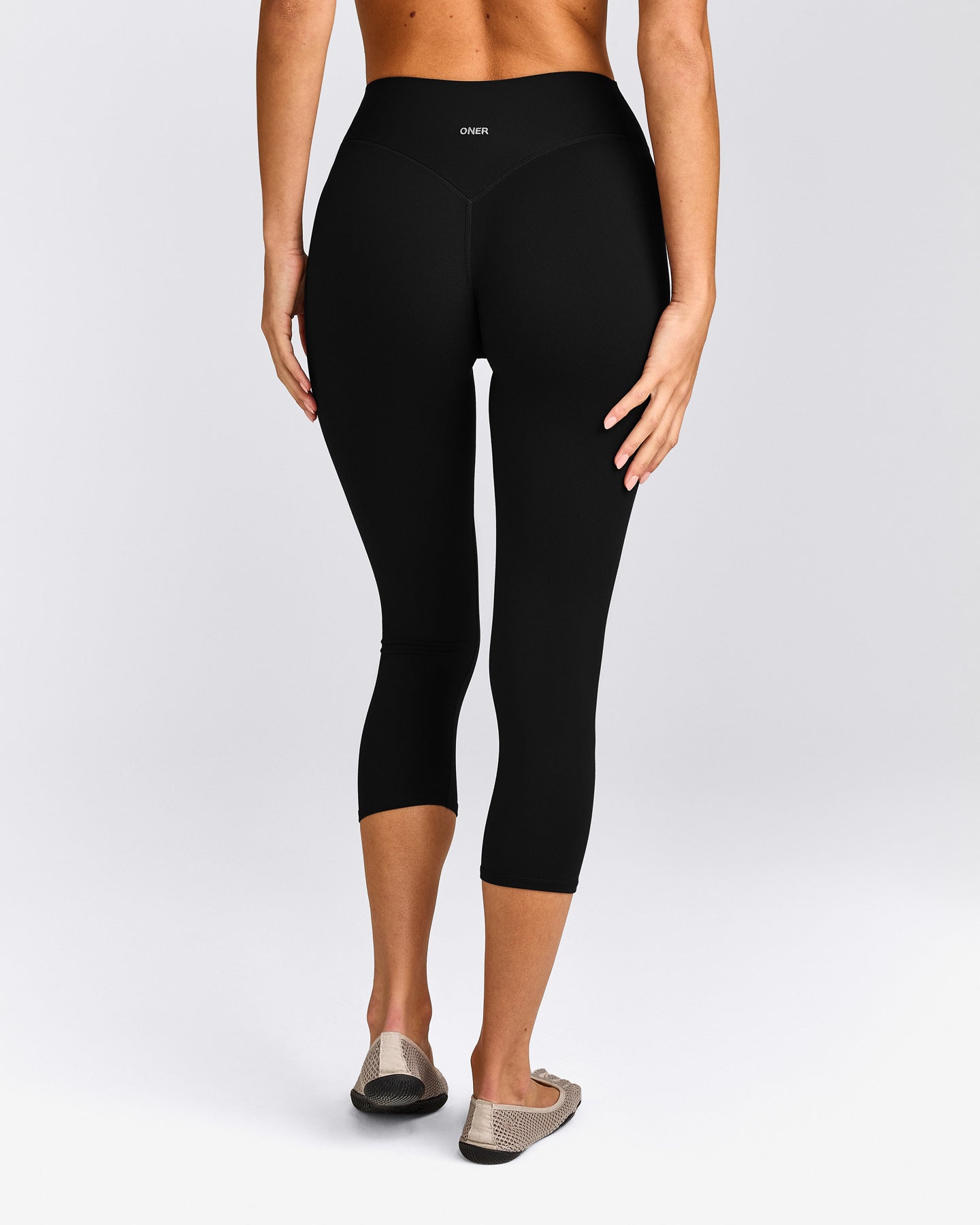 SoftMotion™ 3/4 Length Leggings with Gray Logo | Black