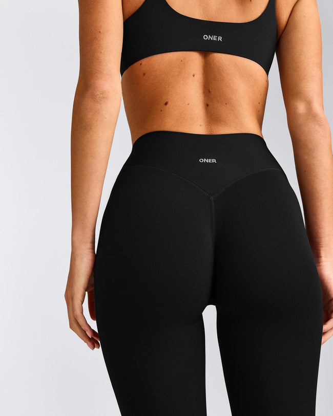 SoftMotion™ 3/4 Length Leggings with Gray Logo | Black