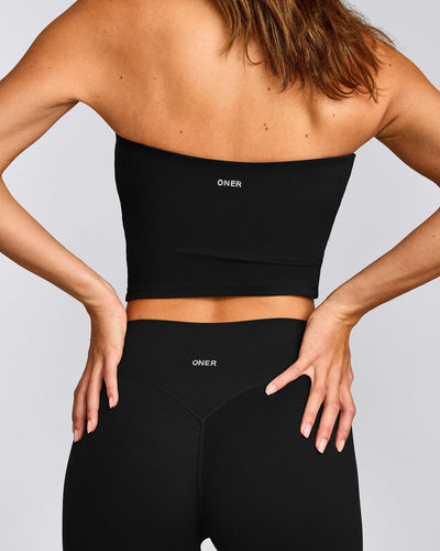 SoftMotion™ Bandeau Mid Tank Top with Built in Bra Shelf with Gray Logo | Black