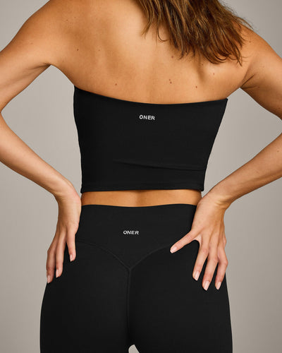 SoftMotion™ Bandeau Mid Tank Top with Built in Bra Shelf with Gray Logo | Black