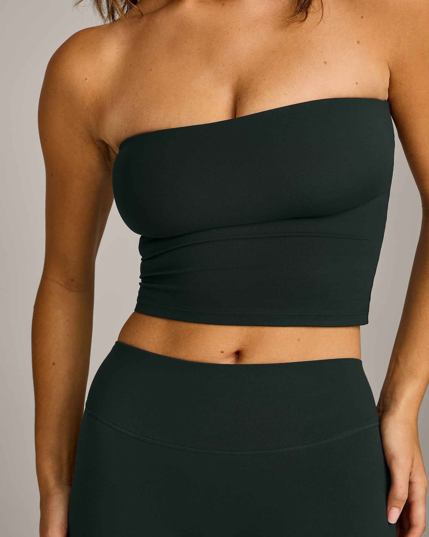 SoftMotion™ Bandeau Mid Tank Top with Built in Bra Shelf with Gray Logo | Emerald Noir