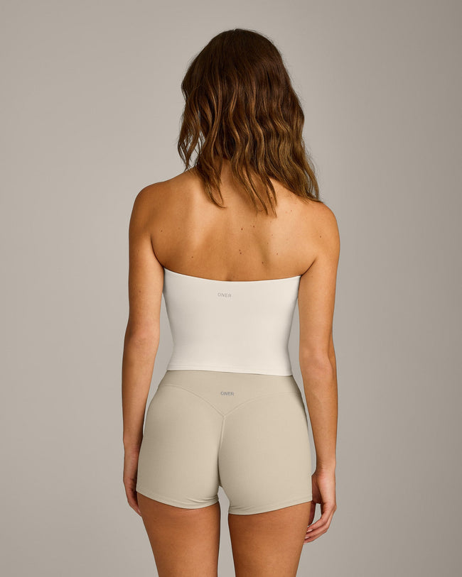 SoftMotion™ Bandeau Mid Tank Top with Built in Bra Shelf with Gray Logo | Marshmallow White