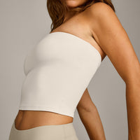 SoftMotion™ Bandeau Mid Tank Top with Built in Bra Shelf with Gray Logo | Marshmallow White