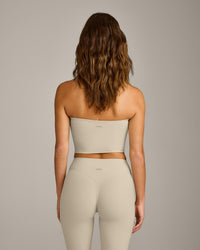 SoftMotion™ Bandeau Mid Tank Top with Built in Bra Shelf with Gray Logo | Oatmeal