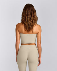 SoftMotion™ Bandeau Mid Tank Top with Built in Bra Shelf with Gray Logo | Oatmeal