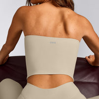 SoftMotion™ Bandeau Mid Tank Top with Built in Bra Shelf with Gray Logo | Oatmeal