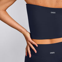 SoftMotion™ Bandeau Mid Tank Top with Built in Bra Shelf with Gray Logo | True Blue
