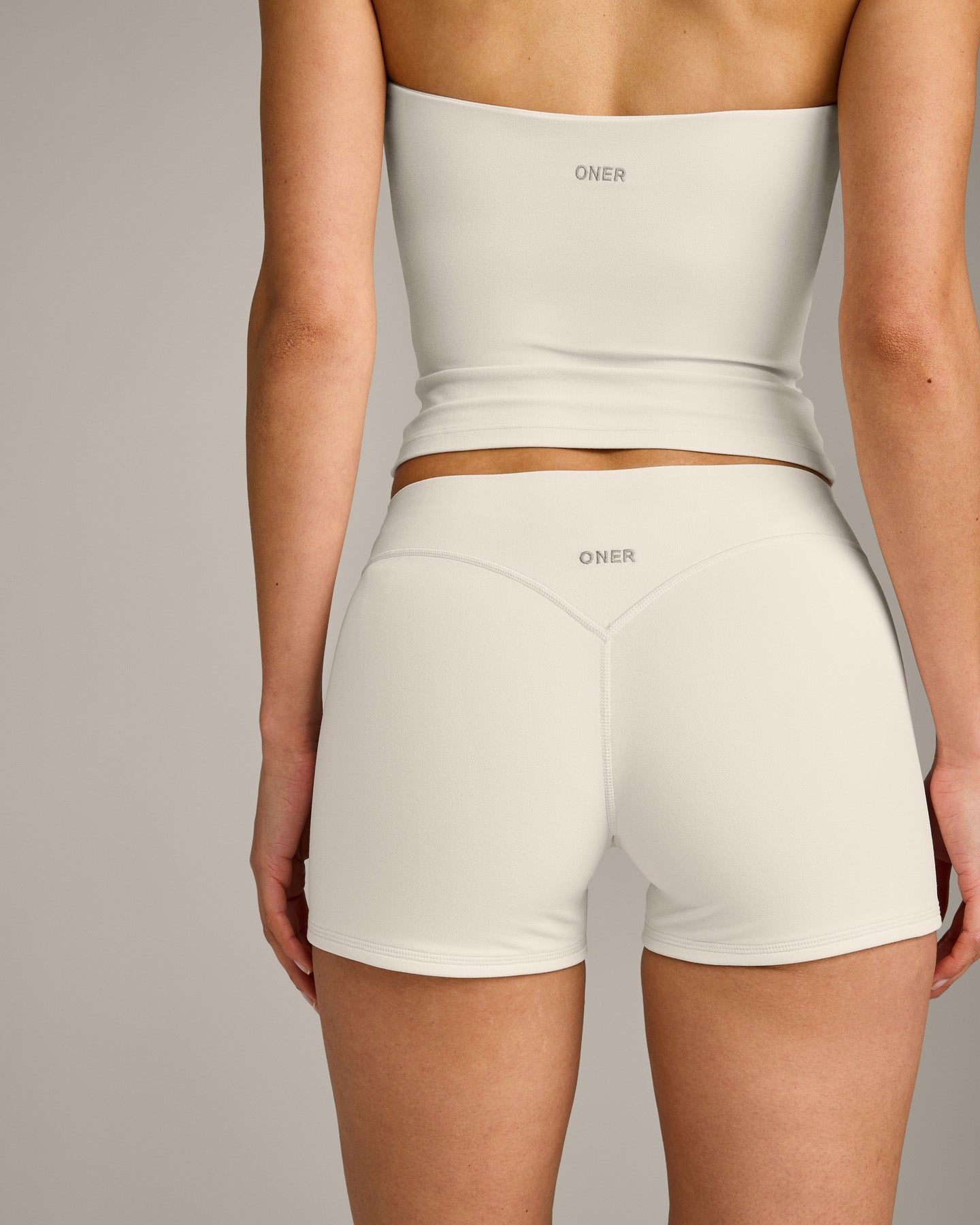 SoftMotion™ Double Layer Mid Rise Shorts 4" with Gray Logo | Marshmallow White