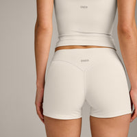 SoftMotion™ Double Layer Mid Rise Shorts 4" with Gray Logo | Marshmallow White