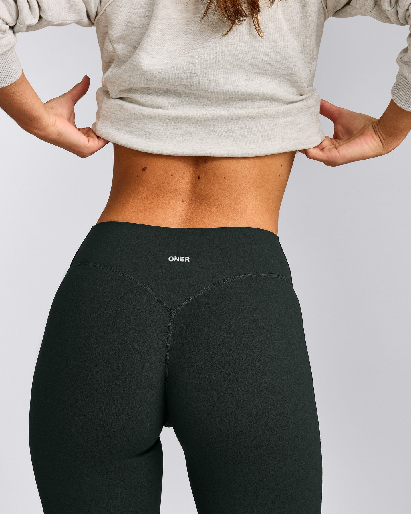 SoftMotion™ Flared Pants with Gray Logo | Emerald Noir