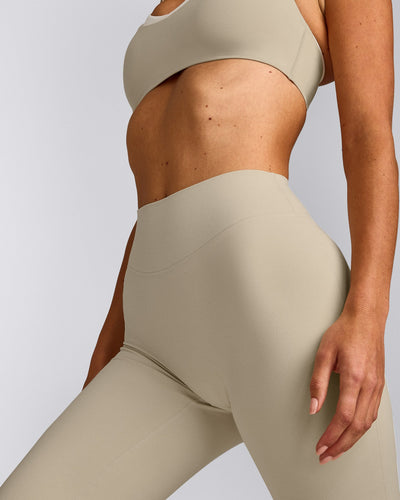 SoftMotion™ Flared Pants with Gray Logo | Oatmeal