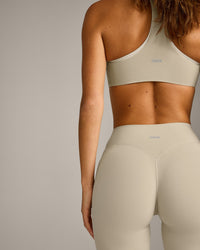 SoftMotion™ Flared Pants with Gray Logo | Oatmeal