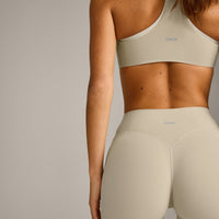SoftMotion™ Flared Pants with Gray Logo | Oatmeal