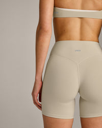 SoftMotion™ High Waisted Shorts 6" with Gray Logo | Oatmeal