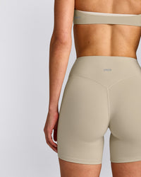 SoftMotion™ High Waisted Shorts 6" with Gray Logo | Oatmeal