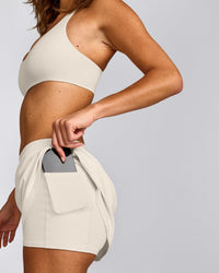 SoftMotion™ Skort with Pockets with Gray Logo | Marshmallow White