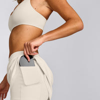 SoftMotion™ Skort with Pockets with Gray Logo | Marshmallow White