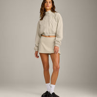 SoftMotion™ Skort with Pockets with Gray Logo | Oatmeal