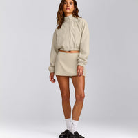 SoftMotion™ Skort with Pockets with Gray Logo | Oatmeal