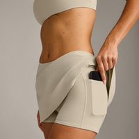 SoftMotion™ Skort with Pockets with Gray Logo | Oatmeal
