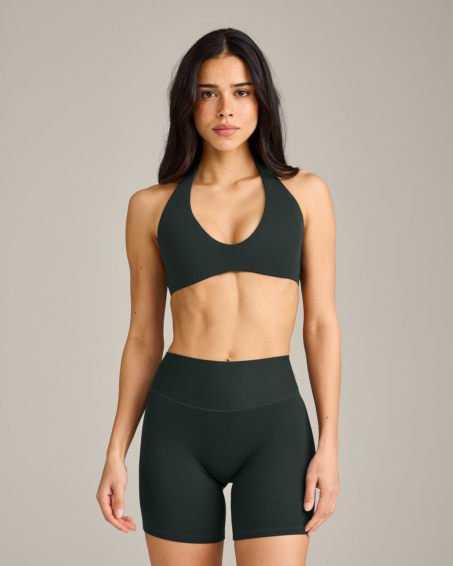 SoftMotion™ Minimal Halter Neck Bralette with Gray Logo | Emerald Noir