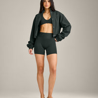 SoftMotion™ Minimal Halter Neck Bralette with Gray Logo | Emerald Noir