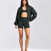 SoftMotion™ Minimal Halter Neck Bralette with Gray Logo | Emerald Noir