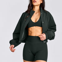 SoftMotion™ Minimal Halter Neck Bralette with Gray Logo | Emerald Noir