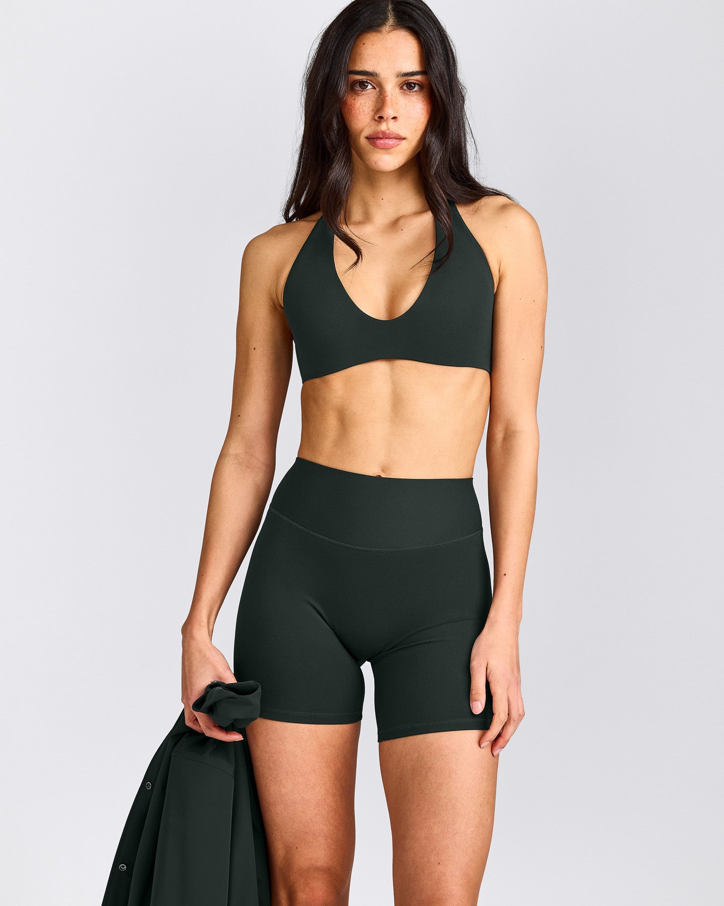 SoftMotion™ Minimal Halter Neck Bralette with Gray Logo | Emerald Noir