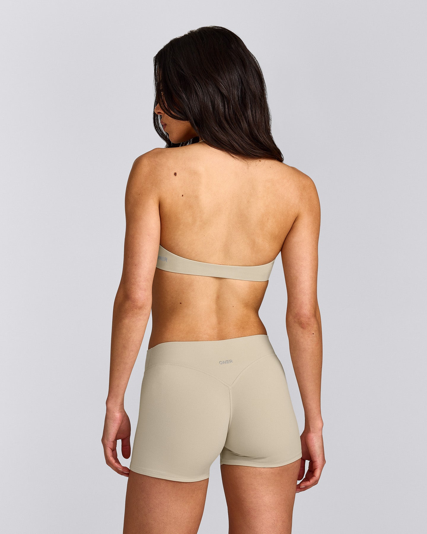 SoftMotion™ Minimal Halter Neck Bralette with Gray Logo | Oatmeal